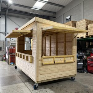 Side View of Our Wooden Kiosk With Wheels (Open Panels)