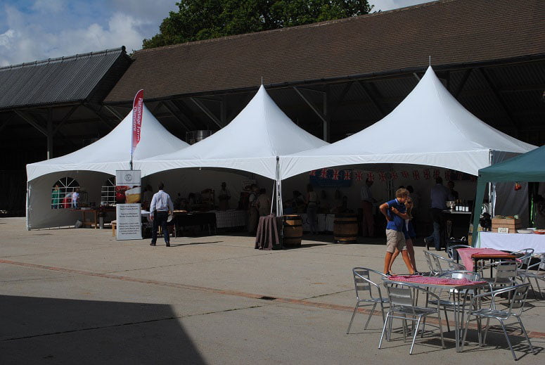 Three White 6m Pagoda Marquee Stands at an event
