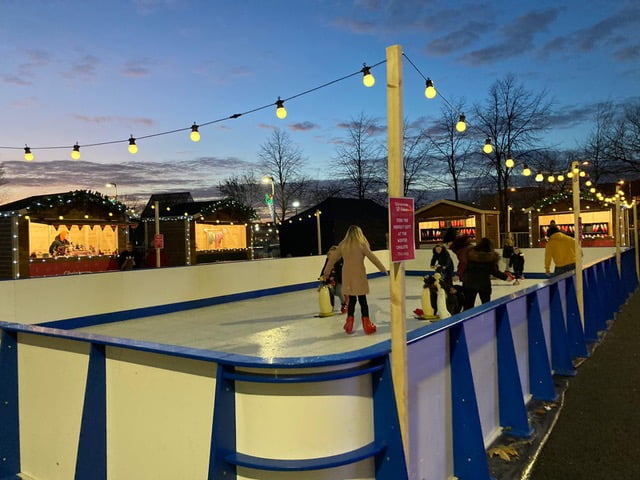 Multiple 3m x 2m Kiosks Placed Around an Ice Rink With Festive Lighting
