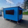 The Front and Side Hatch of a 4m x 2.4m Blue Painted Kiosk
