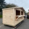 Two Open Panels of a 5m x 2m Wooden Kiosk
