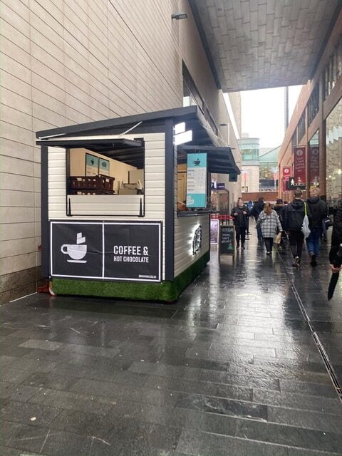 A White 4m x 2m Food Stall in the Liverpool City Centre For Hog Roast
