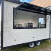 An Open White Trailer Created by Big Kahuna