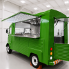 Food truck in green with all the hatch and doors open