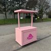 Custom pink flat-pack promotional cart with branded front panel