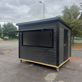 3m x 2.5m composite clad kiosk with serving hatch